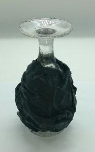 image showing technique of putting glass upside down